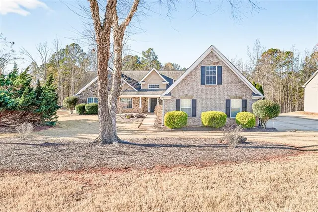 a view of a dry house with a road