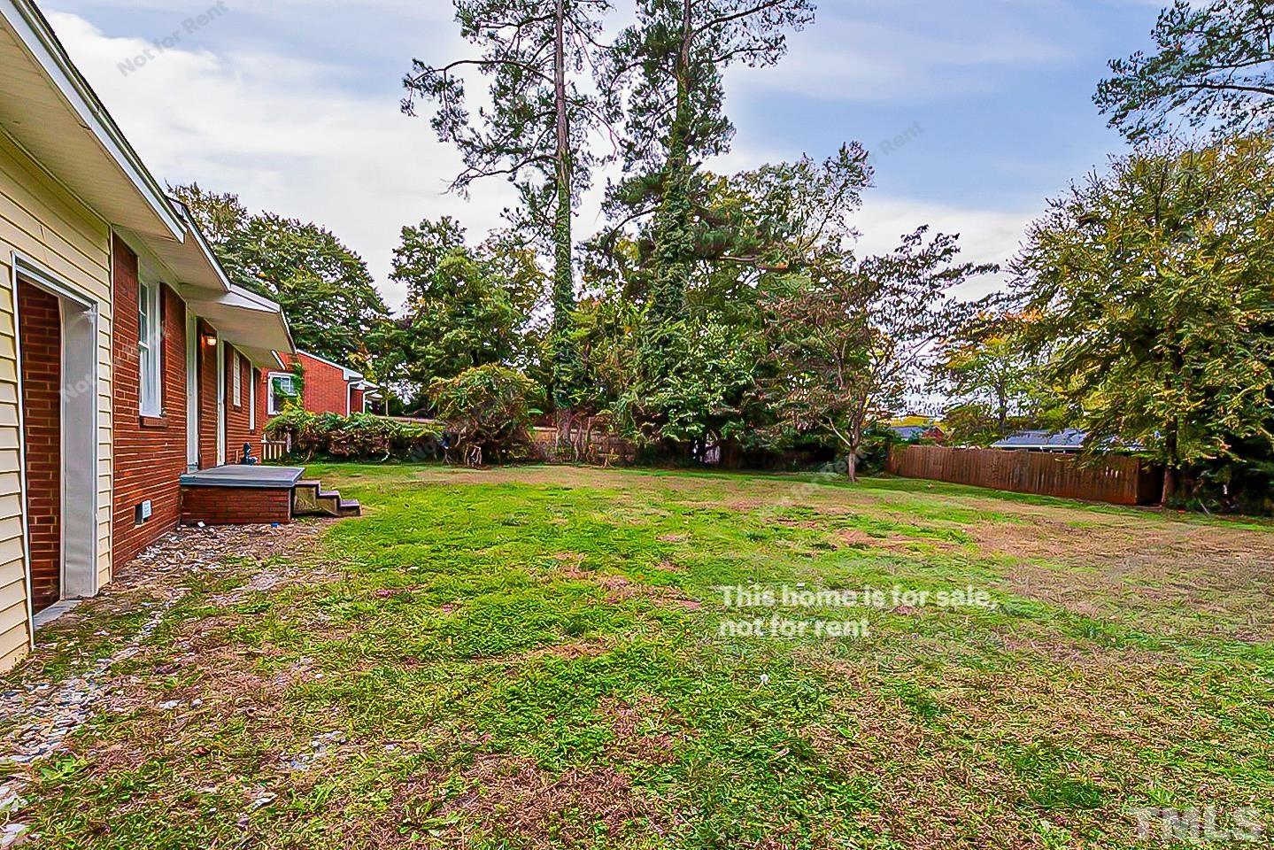 1217 Brighton Road Raleigh, NC 27610 - Photo 11 of 14 a view of yard with swimming pool and green space