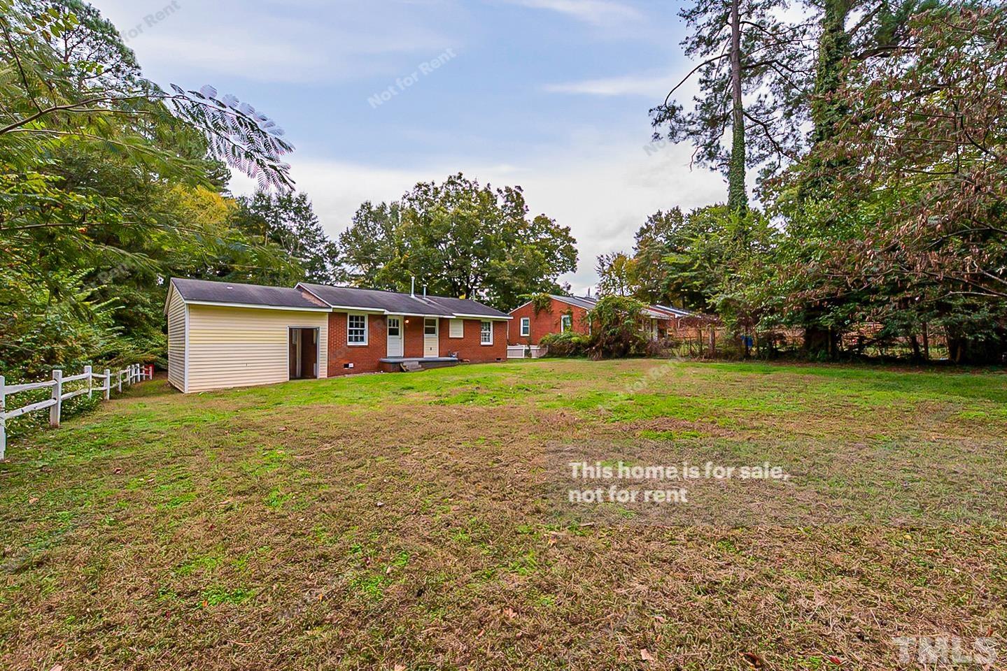 1217 Brighton Road Raleigh, NC 27610 - Photo 14 of 14 a view of a house with a yard