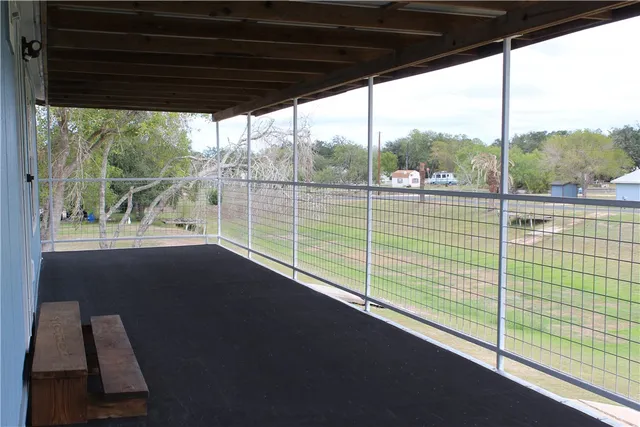 a room with lot of furniture and a window