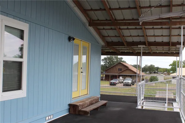 a view of a room with a large window
