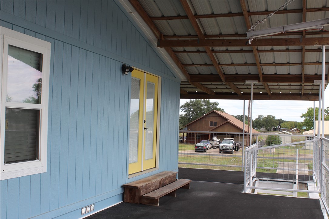 125 Lagarto Ferry Mathis, TX 78368 - Photo 25 of 38 a room with lot of furniture and a window