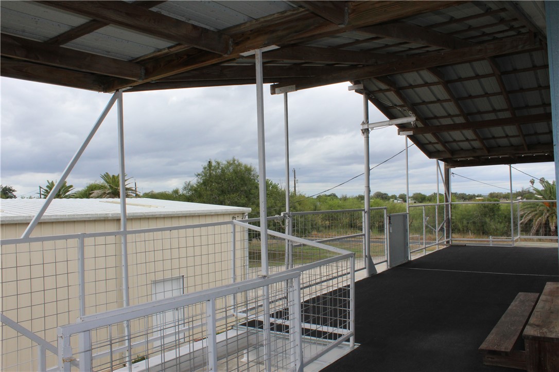 125 Lagarto Ferry Mathis, TX 78368 - Photo 28 of 38 a roof deck with table and chairs