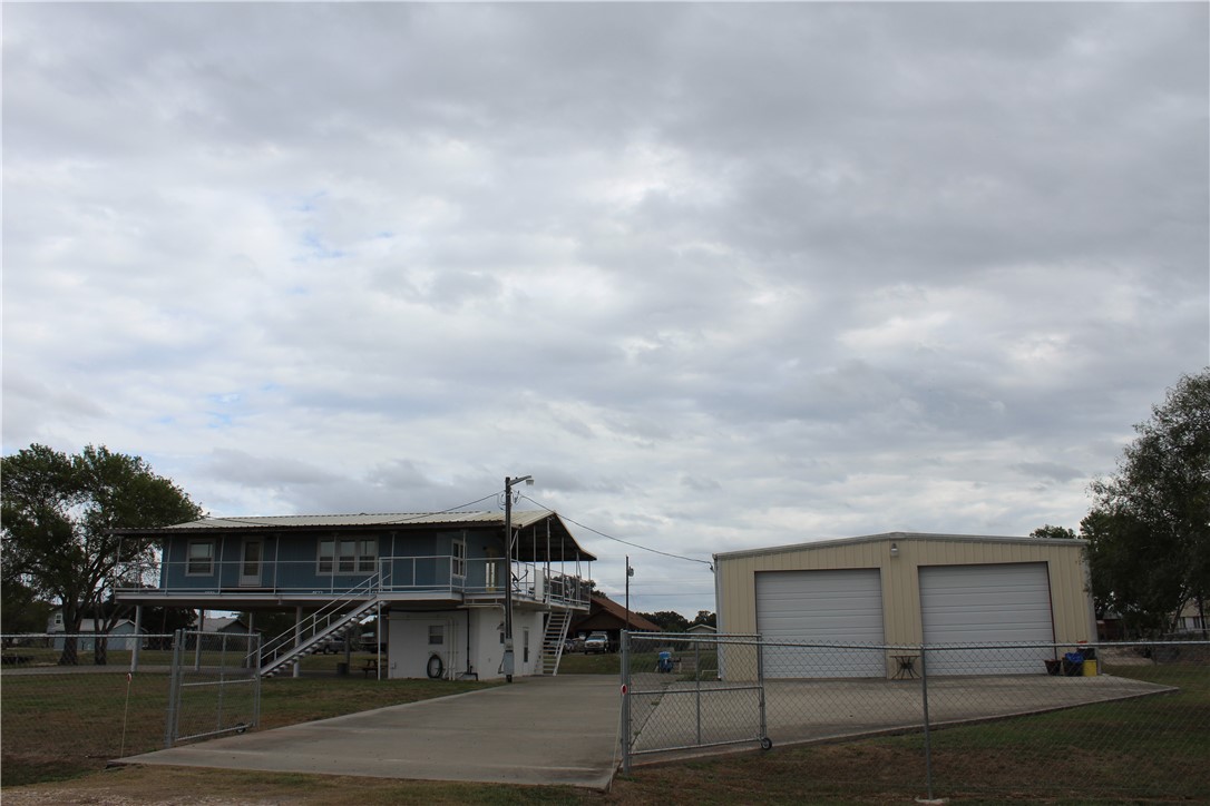 125 Lagarto Ferry Mathis, TX 78368 - Photo 34 of 38 a view of house with yard