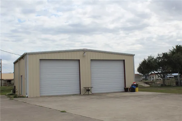 a view of garage and deck