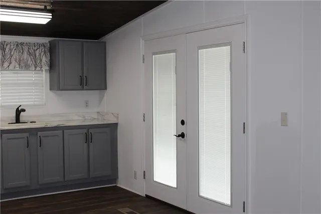 a view of a kitchen from the hallway