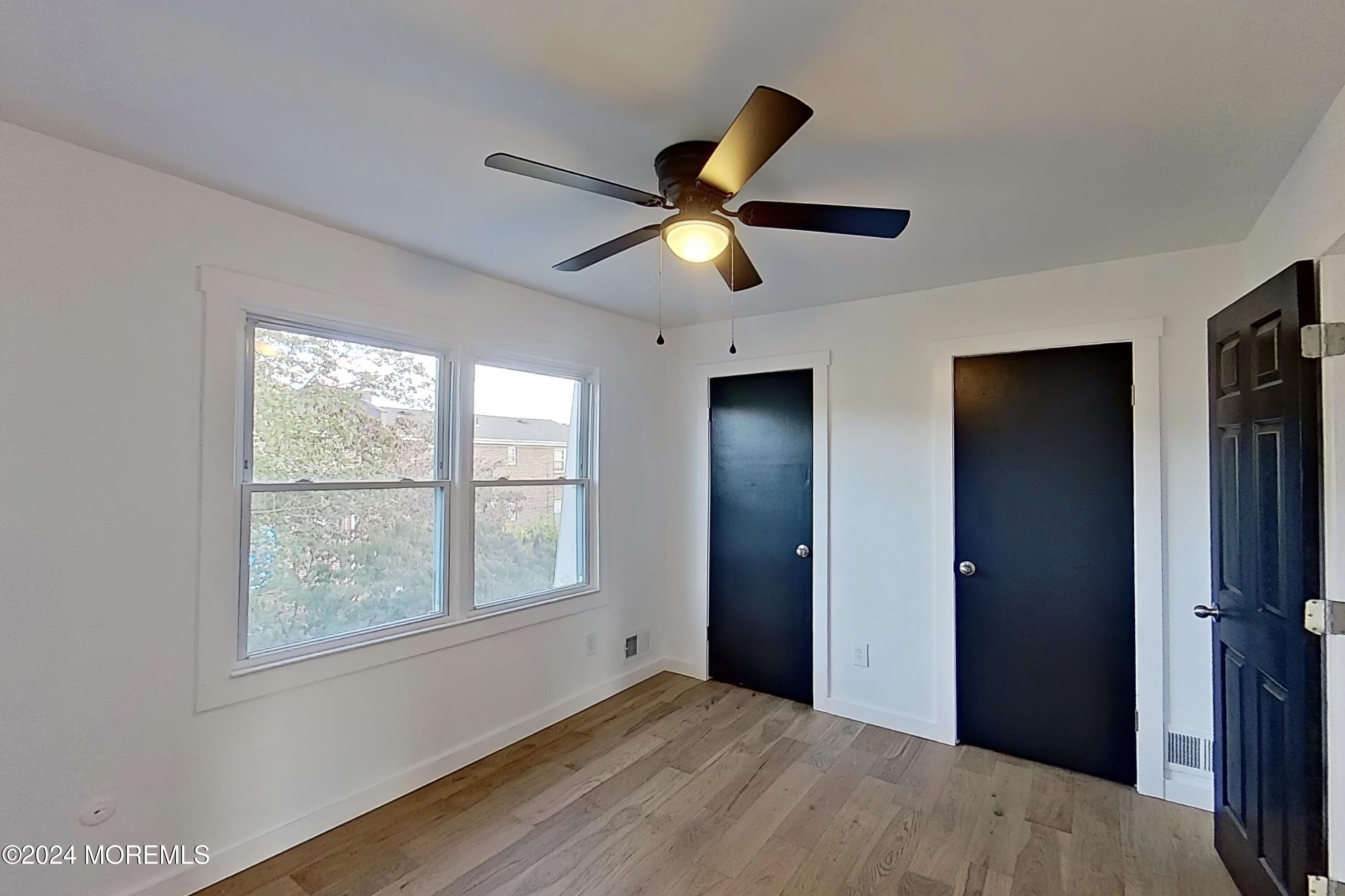178 Sawmill Road, Unit 529 Brick, NJ 08724 - Photo 3 of 46 a view of an empty room with a window