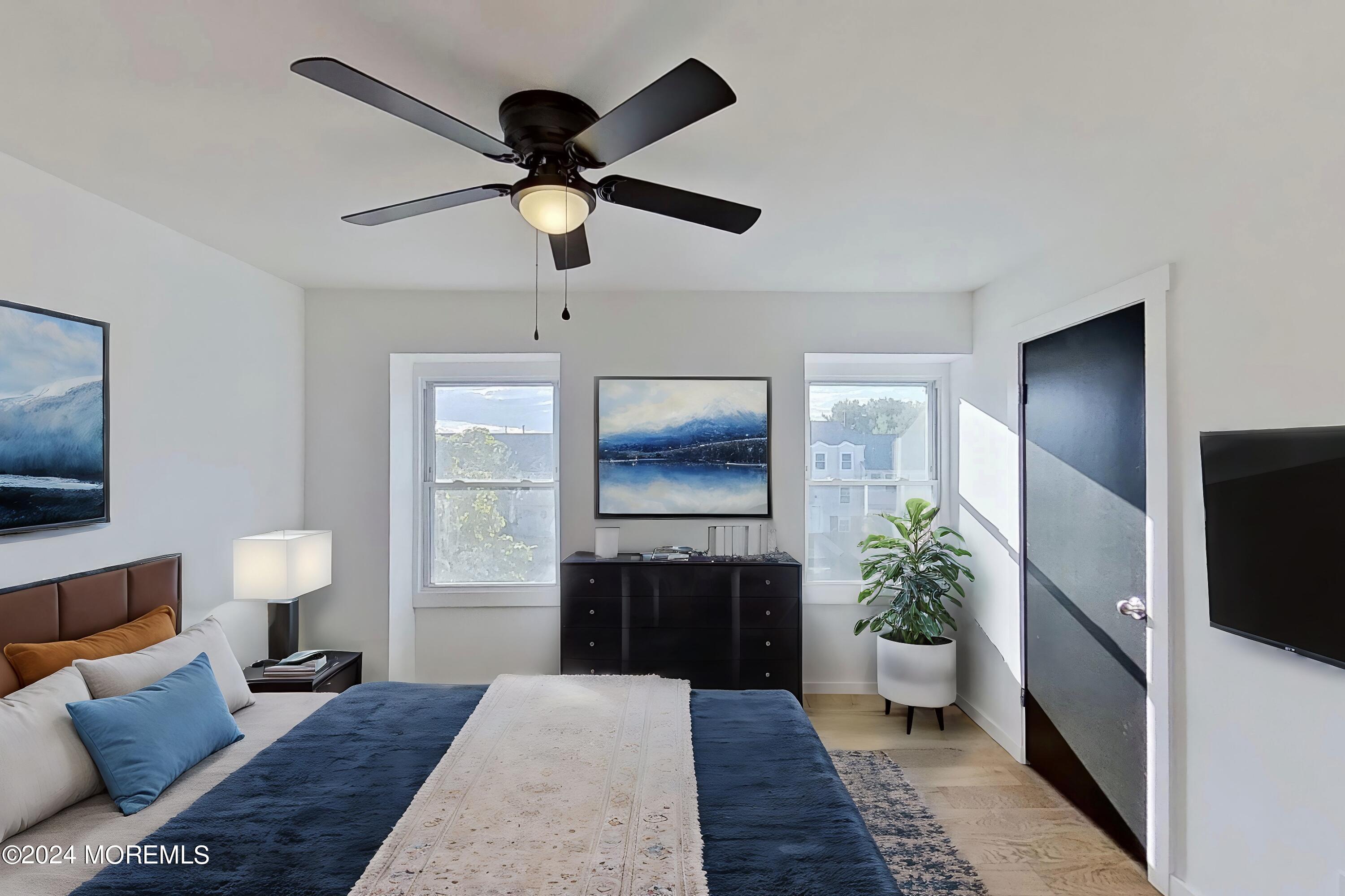 178 Sawmill Road, Unit 529 Brick, NJ 08724 - Photo 46 of 46 a bed room with a bed and a television