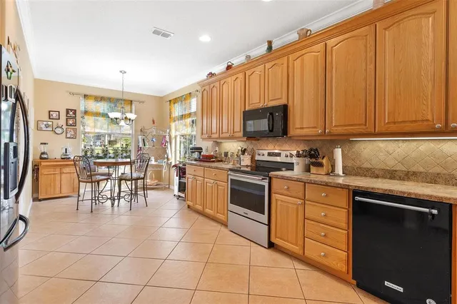 a bedroom with a bed and a television