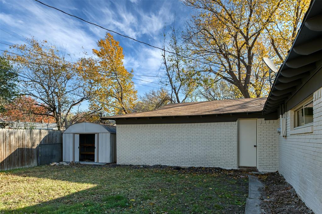 5009 Roxie Street Haltom City, TX 76117 - Photo 36 of 39 a view of a house with a yard