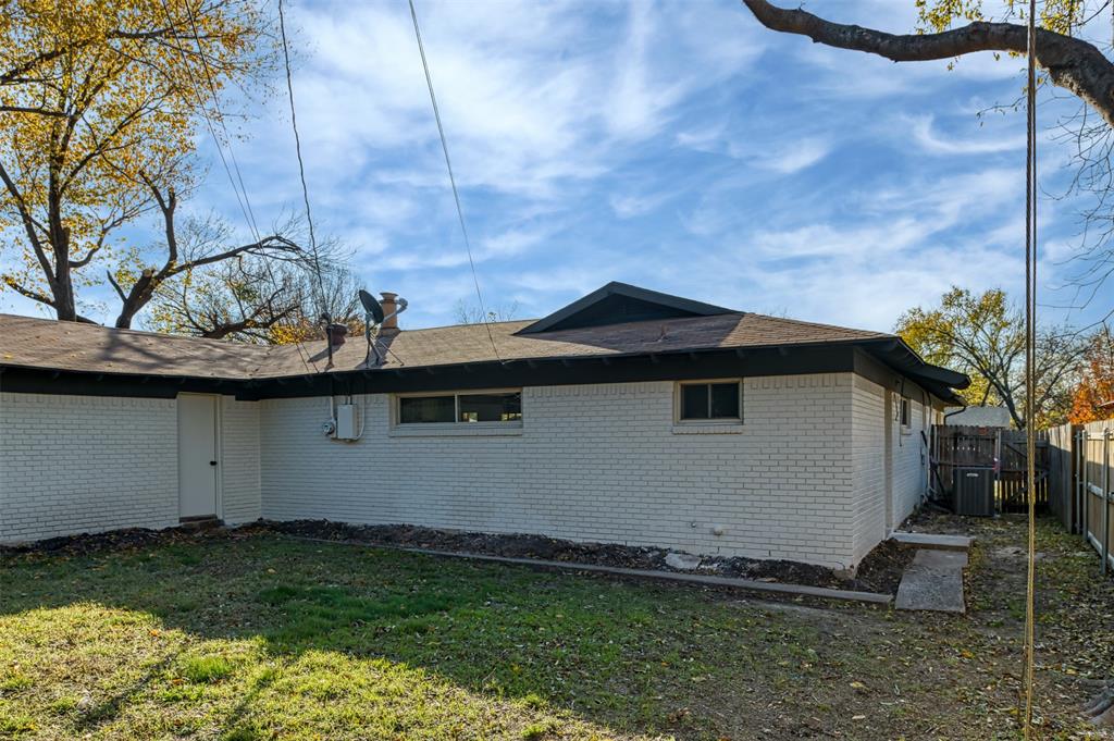 5009 Roxie Street Haltom City, TX 76117 - Photo 38 of 39 a house view with a backyard space