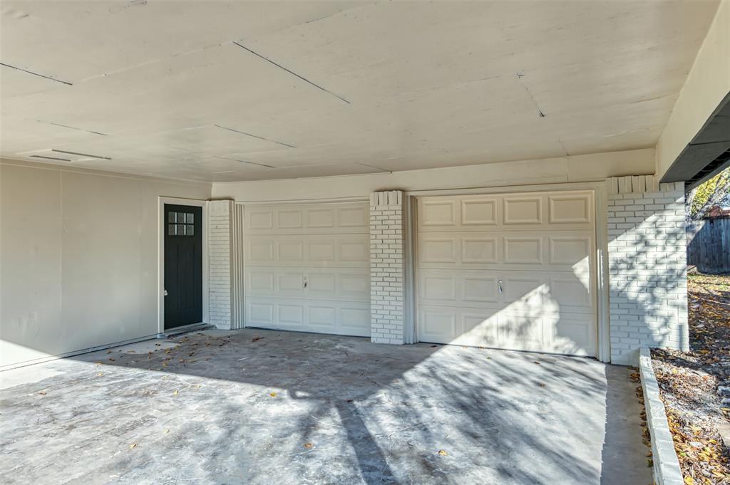 5009 Roxie Street Haltom City, TX 76117 - Photo 5 of 39 a view of a livingroom with wooden floor