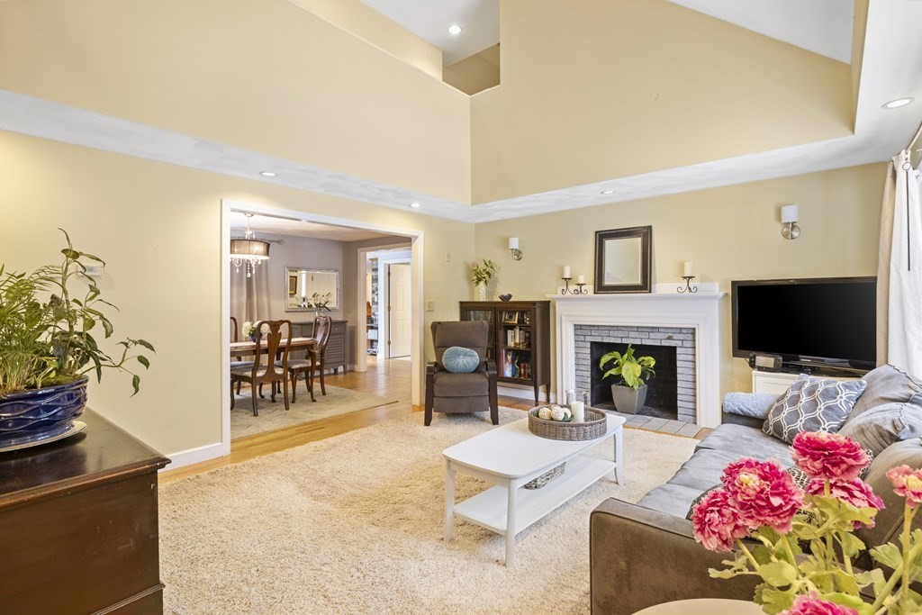 7 Longfellow Road Lexington, MA 02420 - Photo 11 of 30 a living room with furniture and a flat screen tv