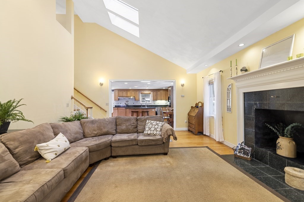 7 Longfellow Road Lexington, MA 02420 - Photo 12 of 30 a living room with furniture and a fireplace