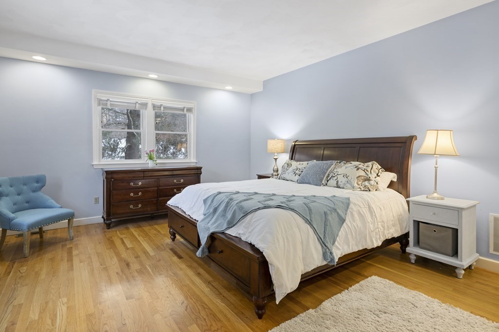 7 Longfellow Road Lexington, MA 02420 - Photo 15 of 30 a bedroom with a bed and a table