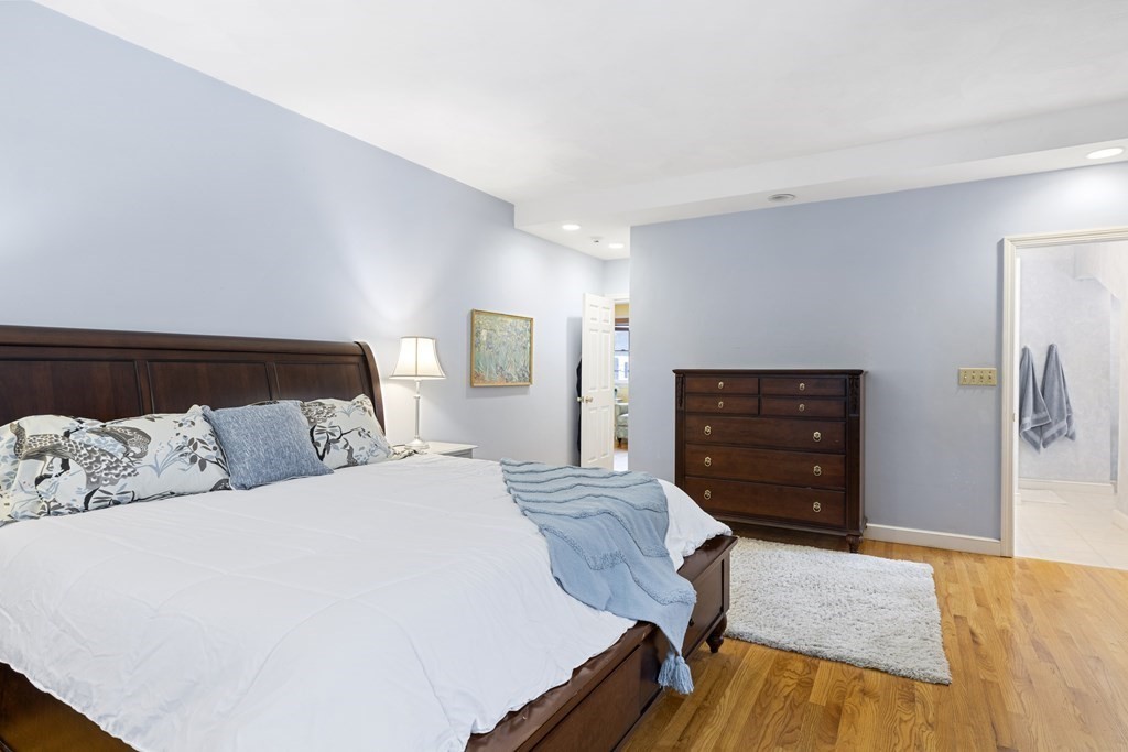 7 Longfellow Road Lexington, MA 02420 - Photo 16 of 30 a bedroom with a bed and dresser