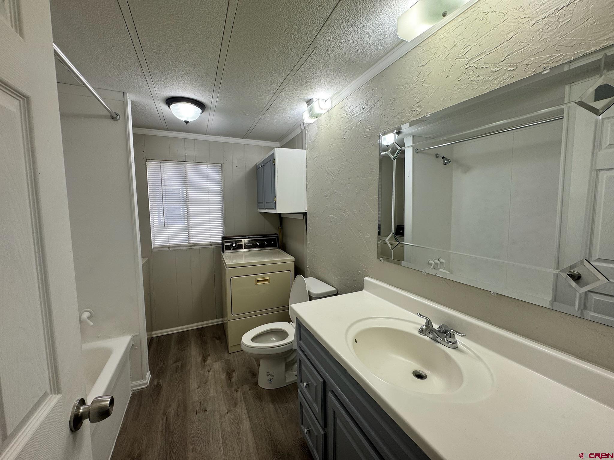 14555 Marine Road, Unit 328 Montrose, CO 81403 - Photo 12 of 20 a bathroom with a sink toilet and shower