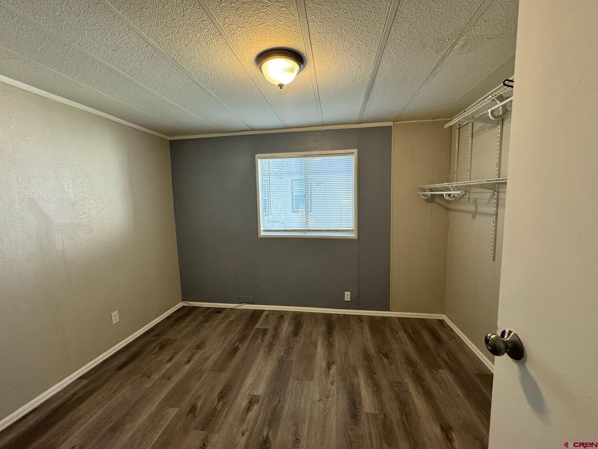14555 Marine Road, Unit 328 Montrose, CO 81403 - Photo 7 of 20 a view of room with a ceiling fan