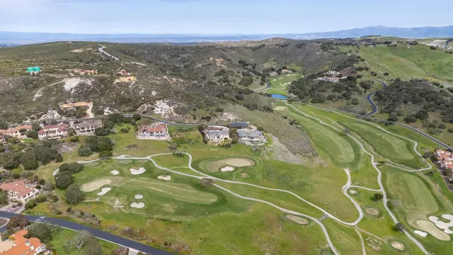 a view of a city with mountains in the background