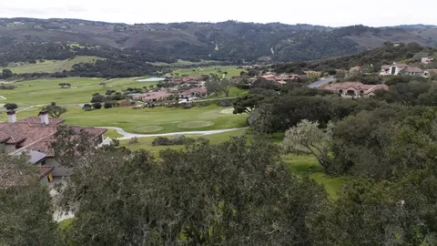 a view of a city with a lake