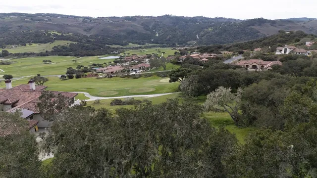 a view of a city with a lake