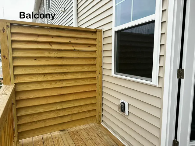 a view of a house with a door and a window