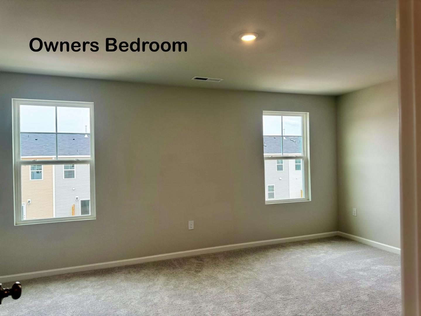 152 Sweet Lilac Way Raleigh, NC 27610 - Photo 19 of 40 an empty room with a window