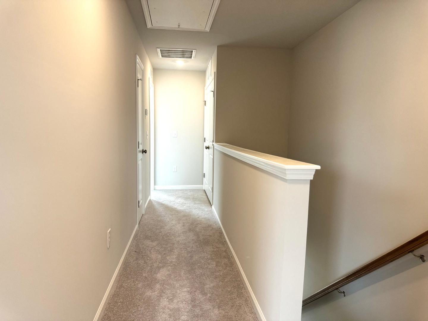 152 Sweet Lilac Way Raleigh, NC 27610 - Photo 24 of 40 a view of a room with wooden floor