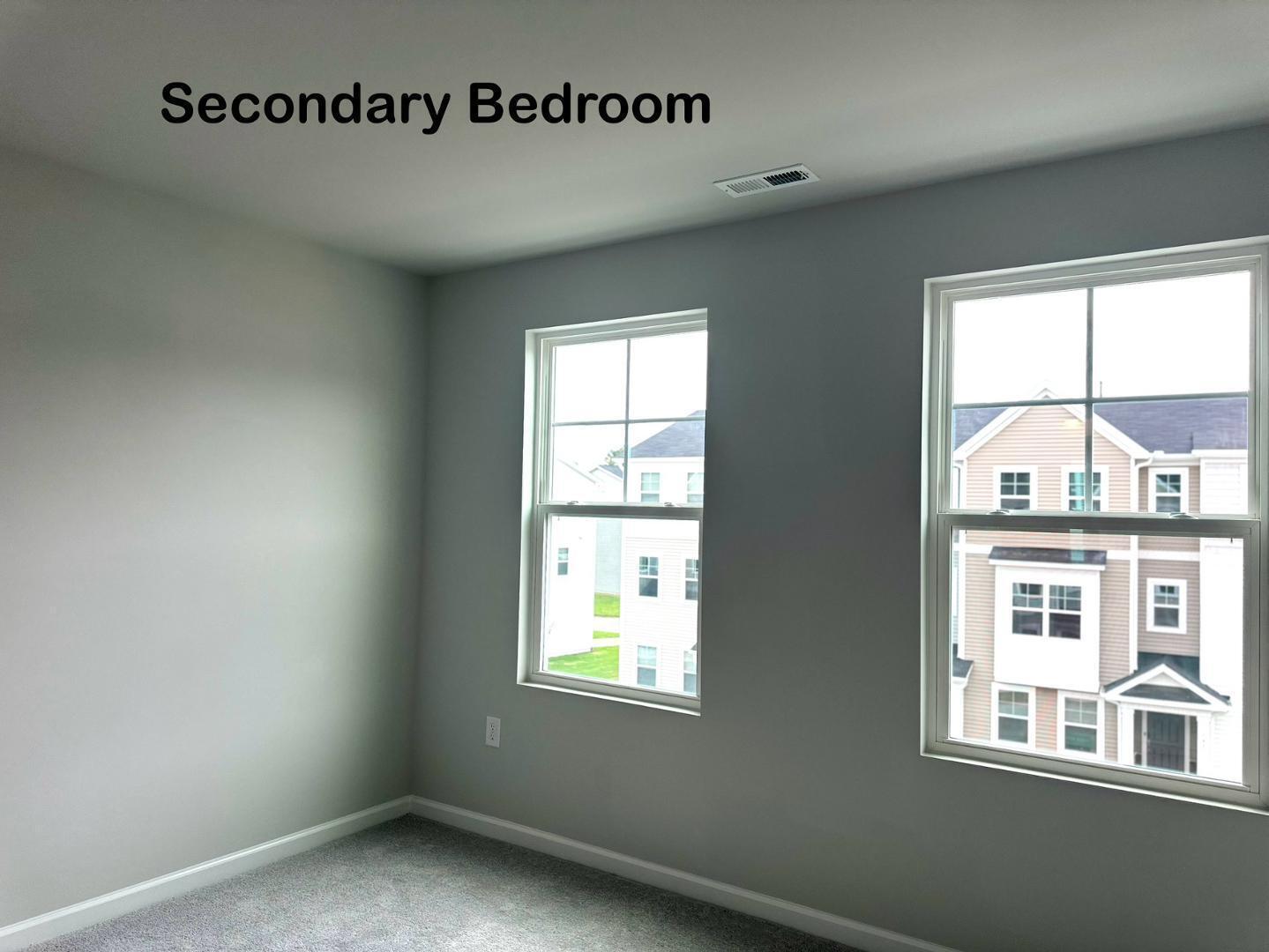 152 Sweet Lilac Way Raleigh, NC 27610 - Photo 25 of 40 a view of an empty room with a window