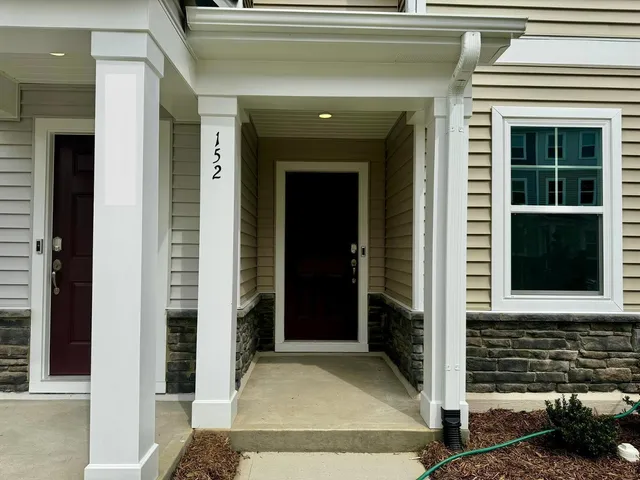 a front view of a house with a entrance