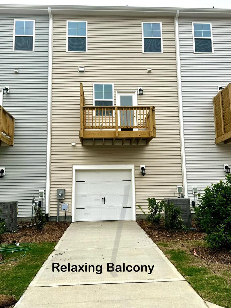 152 Sweet Lilac Way Raleigh, NC 27610 - Photo 35 of 40 a view of a building with entryway