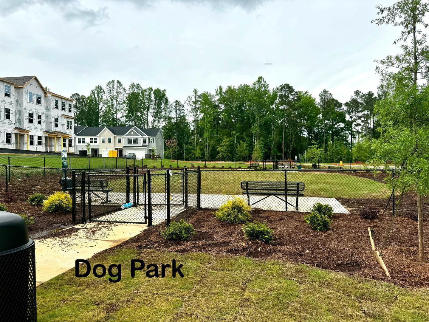 152 Sweet Lilac Way Raleigh, NC 27610 - Photo 37 of 40 a view of a park with swings