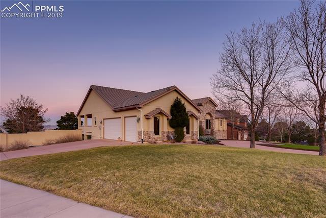 6155 Wilson Road Colorado Springs, CO 80919 - Photo 34 of 35 Coming back around to the front of the home. Awesome corner lot. Must see!