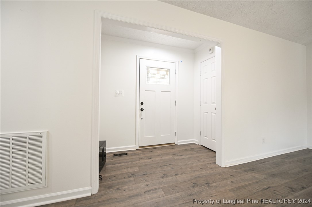 5057 Summer Ridge Road Fayetteville, NC 28303 - Photo 4 of 29 a view of an empty room