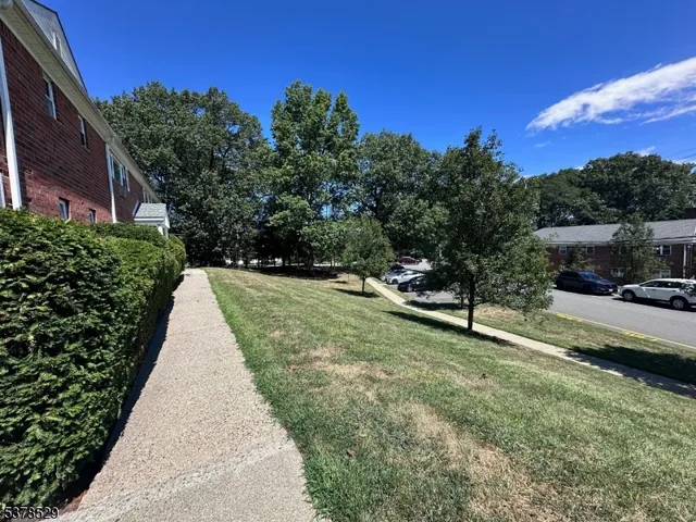 a view of a backyard with green space