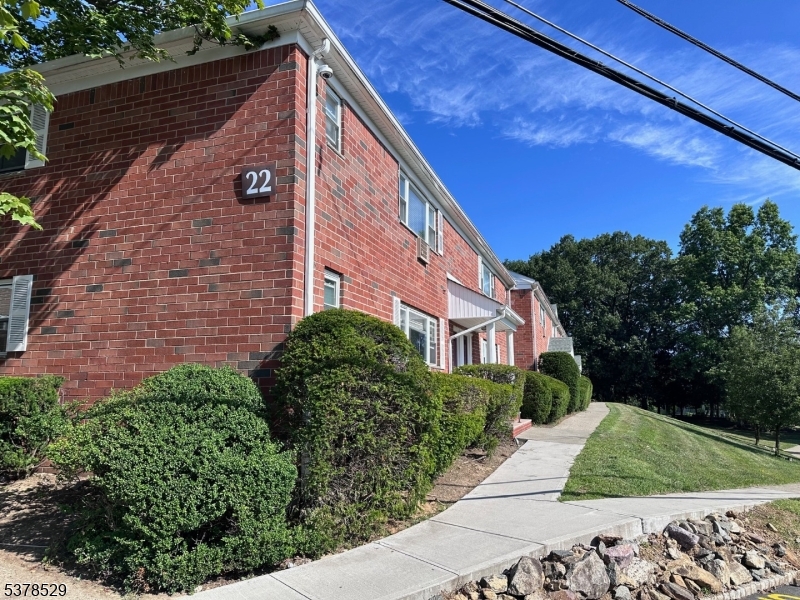 2467 Highway 10, Unit 6B Morris Plains, NJ 07950 - Photo 2 of 18 a view of a house with a yard