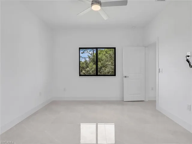 an empty room with a window