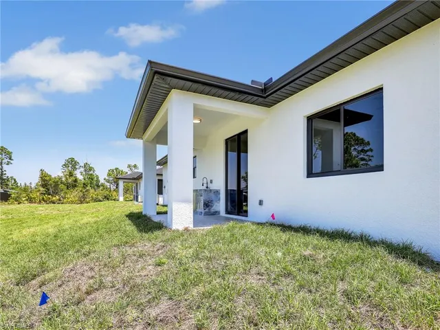 a front view of a house with yard
