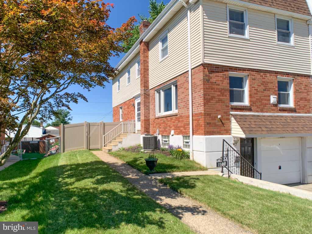 1148 Morefield Road Philadelphia, PA 19115 - Photo 1 of 35 a view of a house with a yard