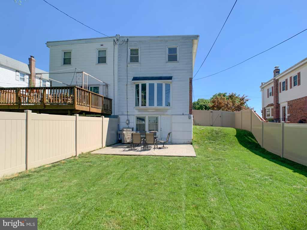 1148 Morefield Road Philadelphia, PA 19115 - Photo 30 of 35 a view of a house with backyard and sitting area