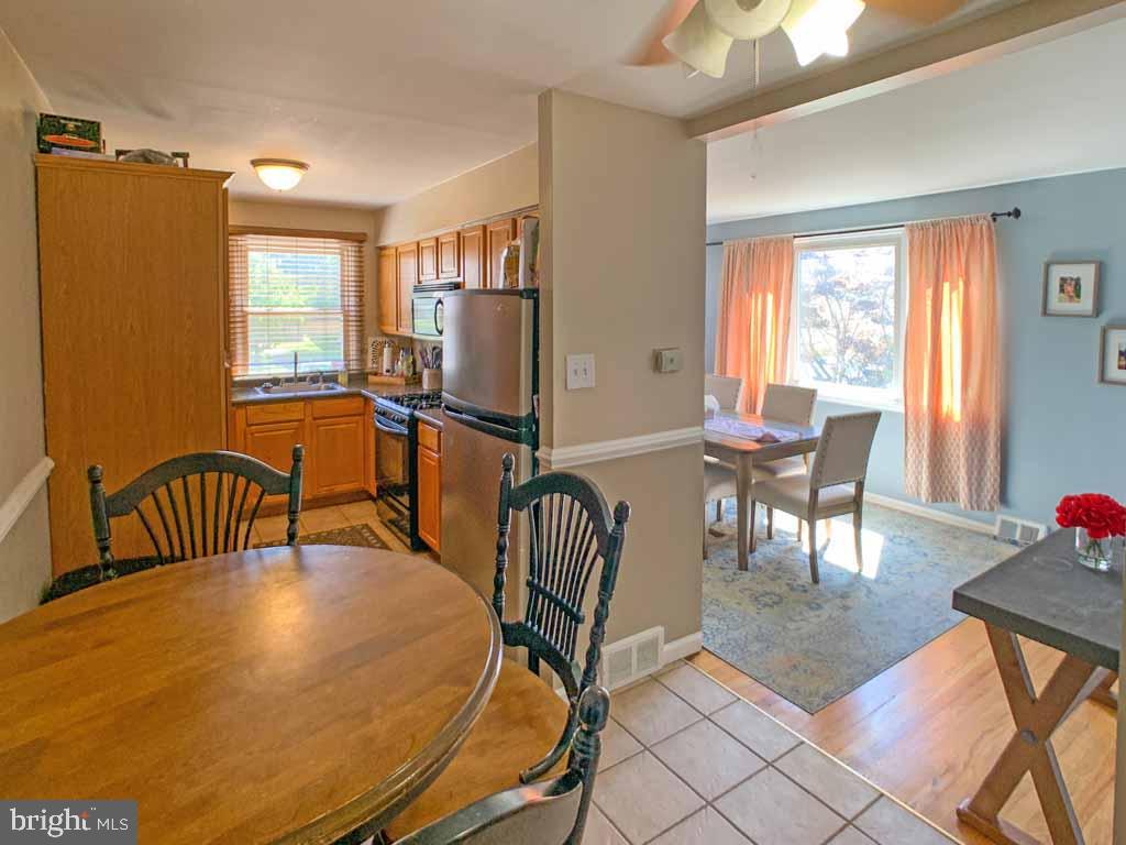 1148 Morefield Road Philadelphia, PA 19115 - Photo 9 of 35 a dining room with furniture and window