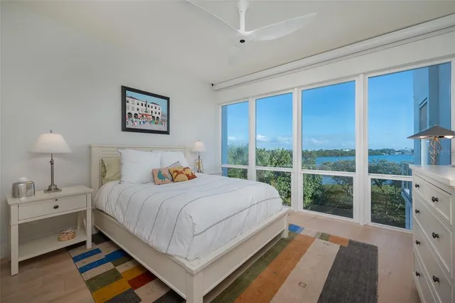 an aerial view of a house with a lake view