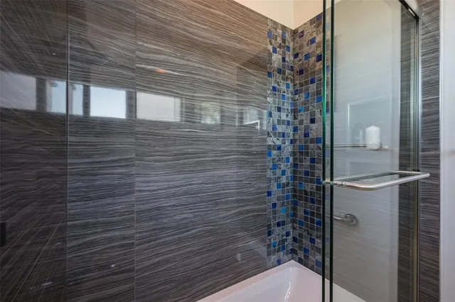 a view of a swimming pool with an outdoor seating and a garden