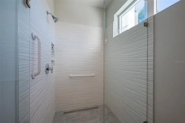 a view of a lake with outdoor seating