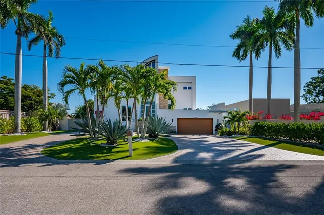 a front view of a house with swimming pool