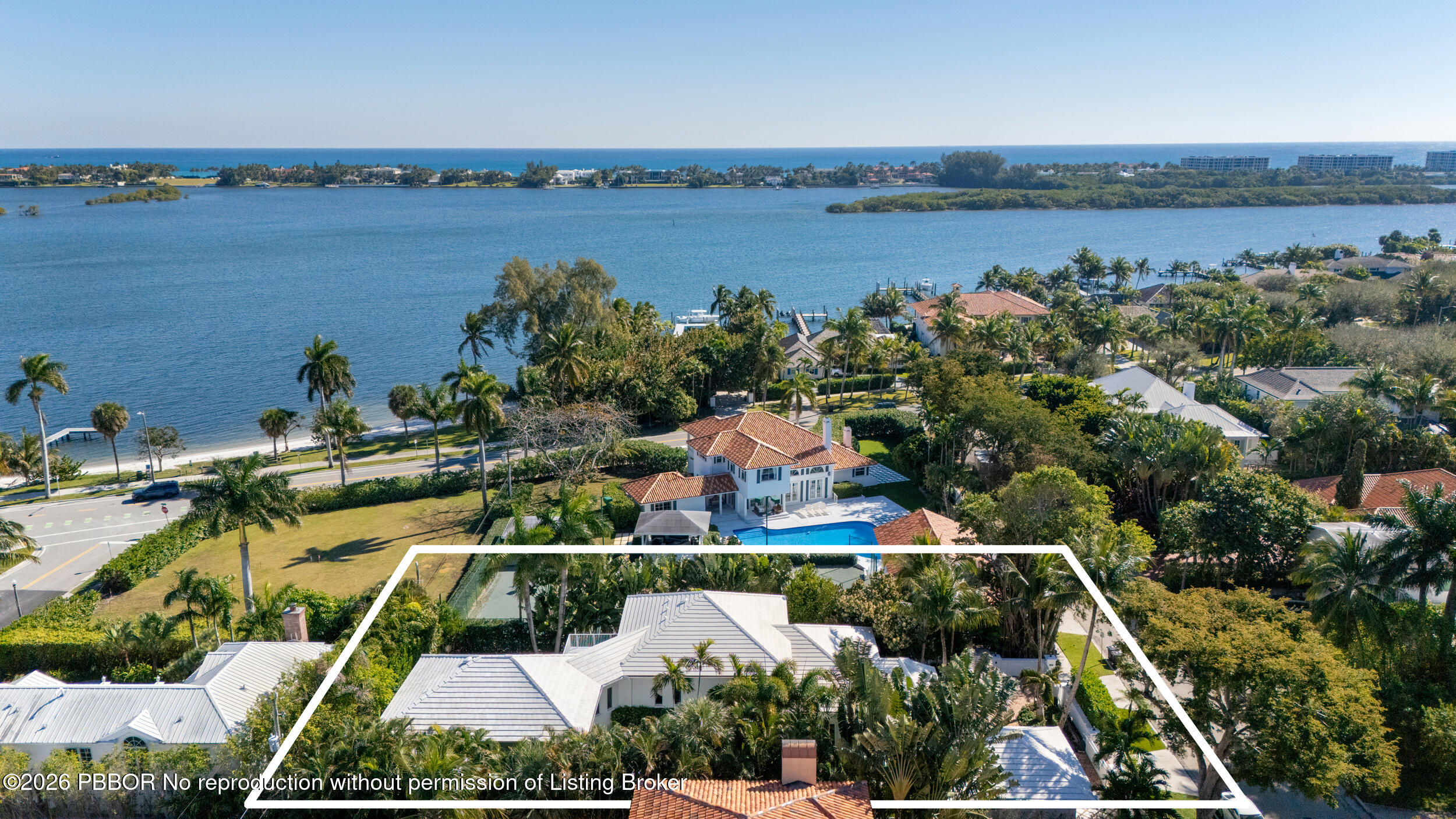 121 Seville Road West Palm Beach, FL 33405 - Photo 65 of 67 an aerial view of a residential houses with outdoor space and lake view