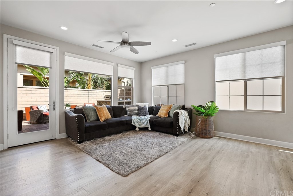 26 Lilac Lake Forest, CA 92630 - Photo 12 of 52 a living room with furniture and windows