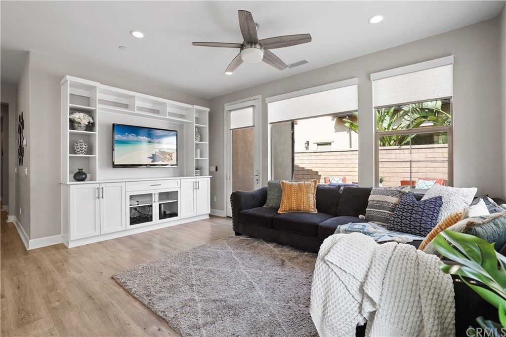 26 Lilac Lake Forest, CA 92630 - Photo 14 of 52 a living room with furniture fireplace and flat screen tv