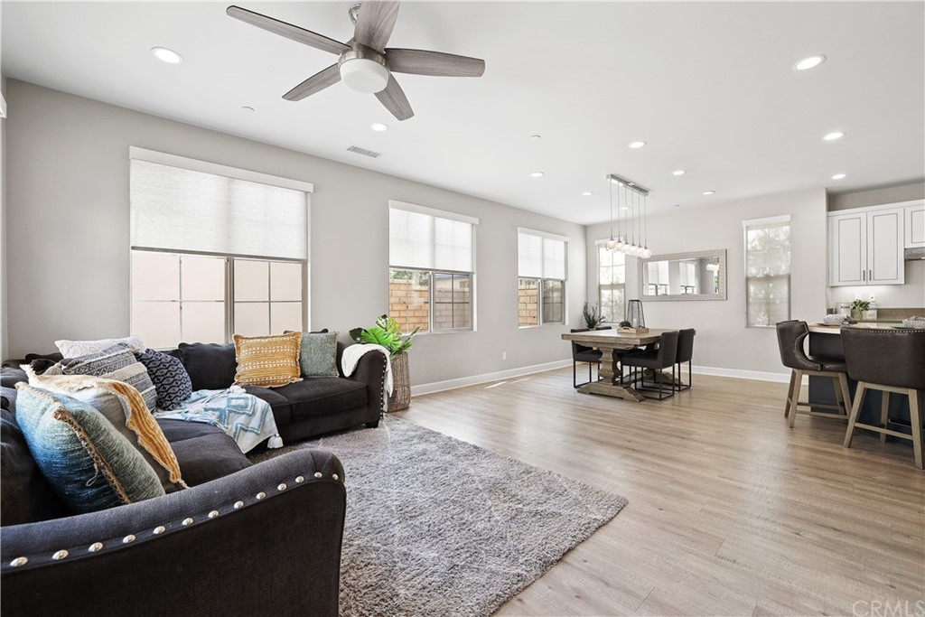 26 Lilac Lake Forest, CA 92630 - Photo 15 of 52 a living room with furniture and wooden floor