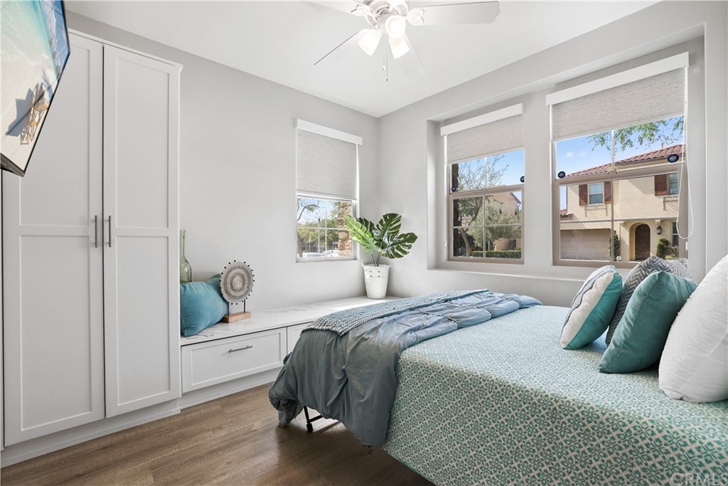 26 Lilac Lake Forest, CA 92630 - Photo 18 of 52 a bedroom with a bed and a window